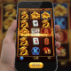 Vibrant online slot machine interface with Asian-themed symbols like dragons and mahjong tiles, showing active gameplay on a modern, mobile-friendly platform, representing PG Soft's appeal to Malaysian players.